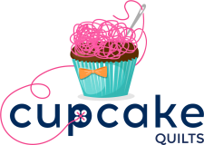 Logo of thread-topped cupcake  for Cupcake Quilts in Texas.
