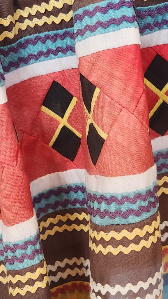 Close-up of Seminole Jacket at Crazy Horse Memorial museum.
